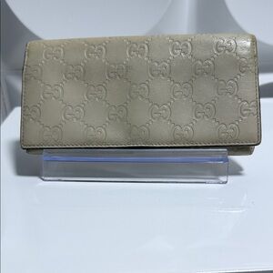 Gucci Beige Embossed GG Continental Wallet